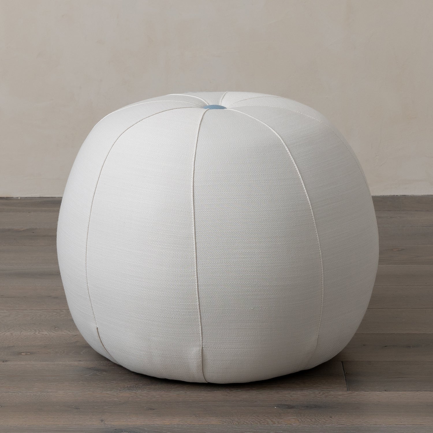 Seabrook Medicine Ball Ottoman in Fresno Alabaster Button in Davenport Blue Eleish Van Breems Home